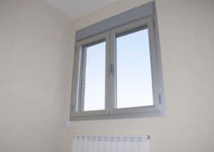 Aluminum window installed over a radiator